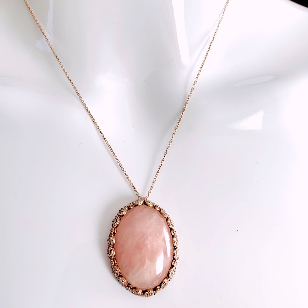 Large oval shaped pink opal pendant in red gold frame red gold chain necklace
